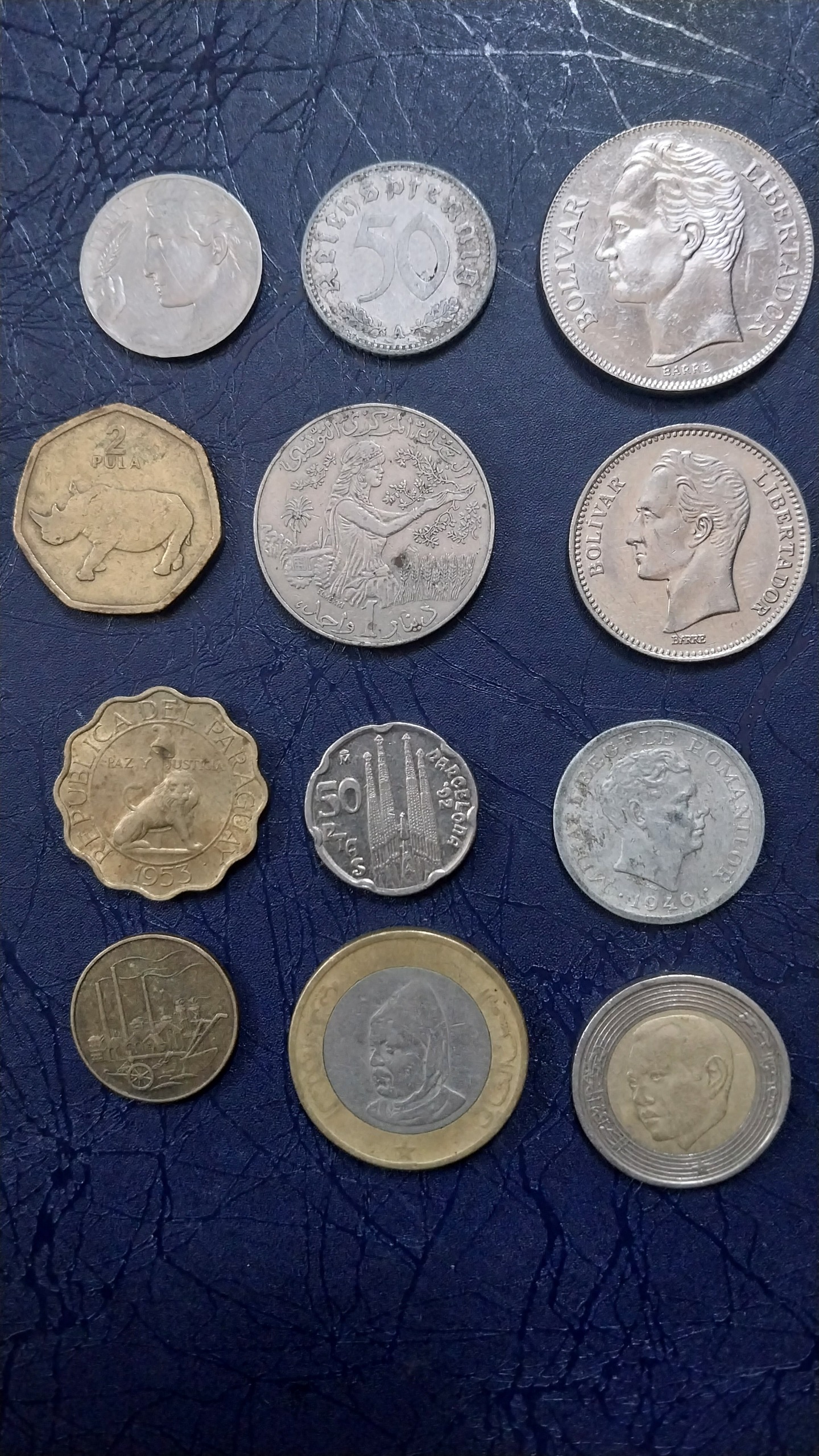 12 عدد سکه خارجی کمیاب