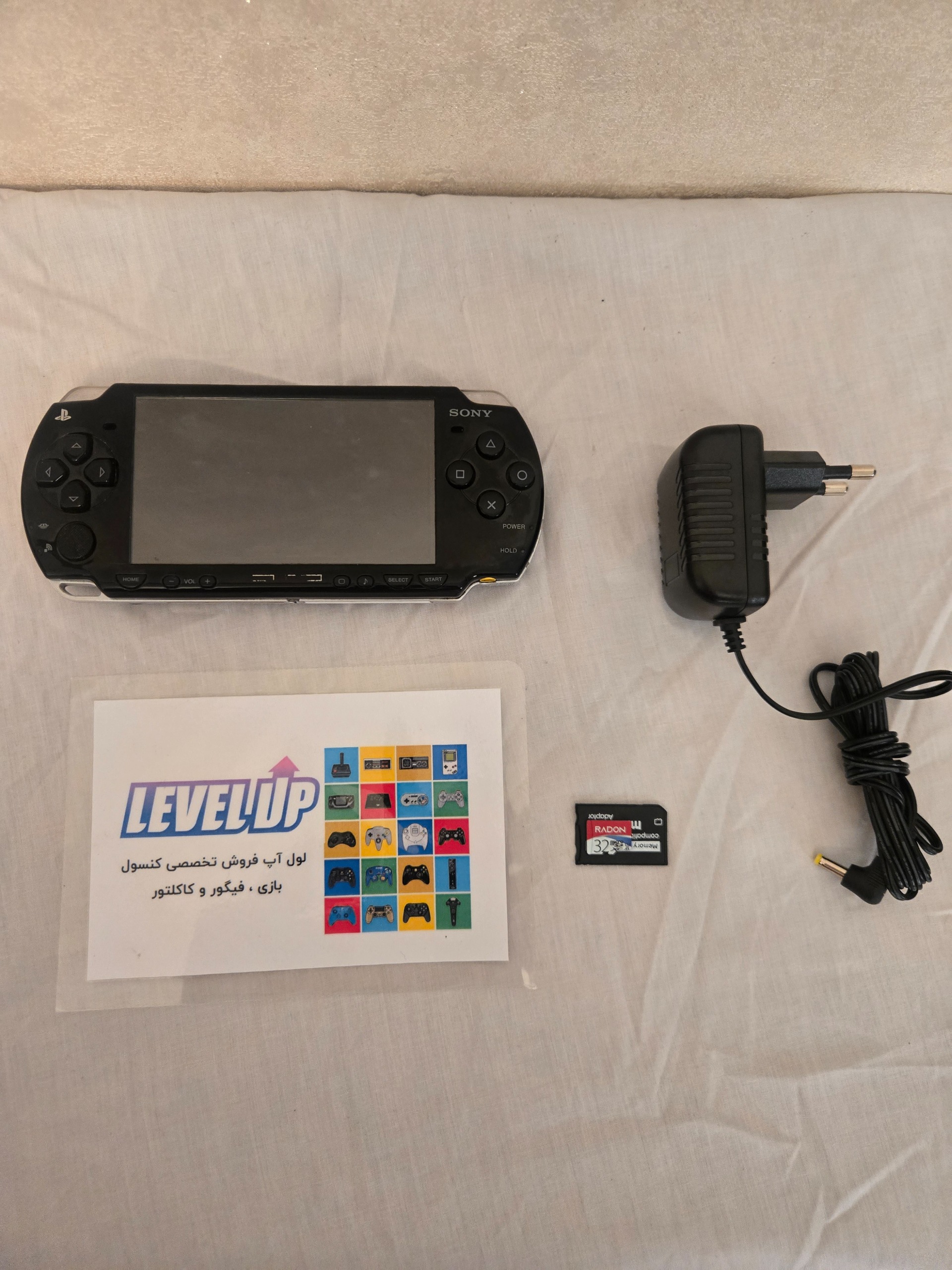 Psp 2004 اورجینال سونی کپی خور با بازی و کیف