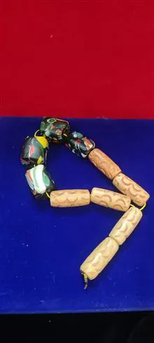 بی