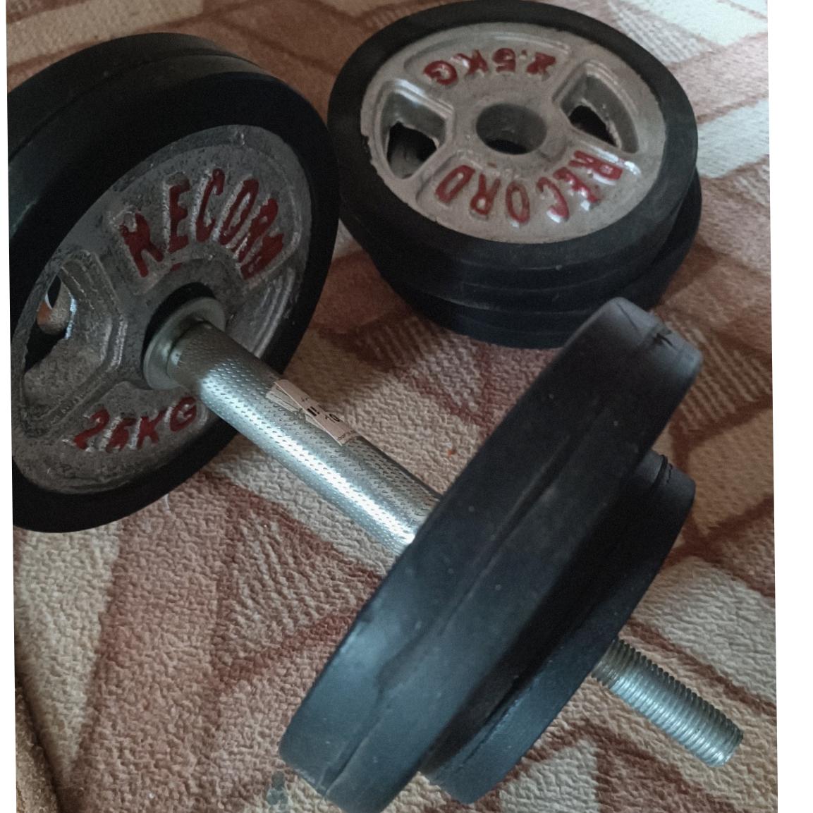 یک جفت دمبل هر کدام 12 کیلو