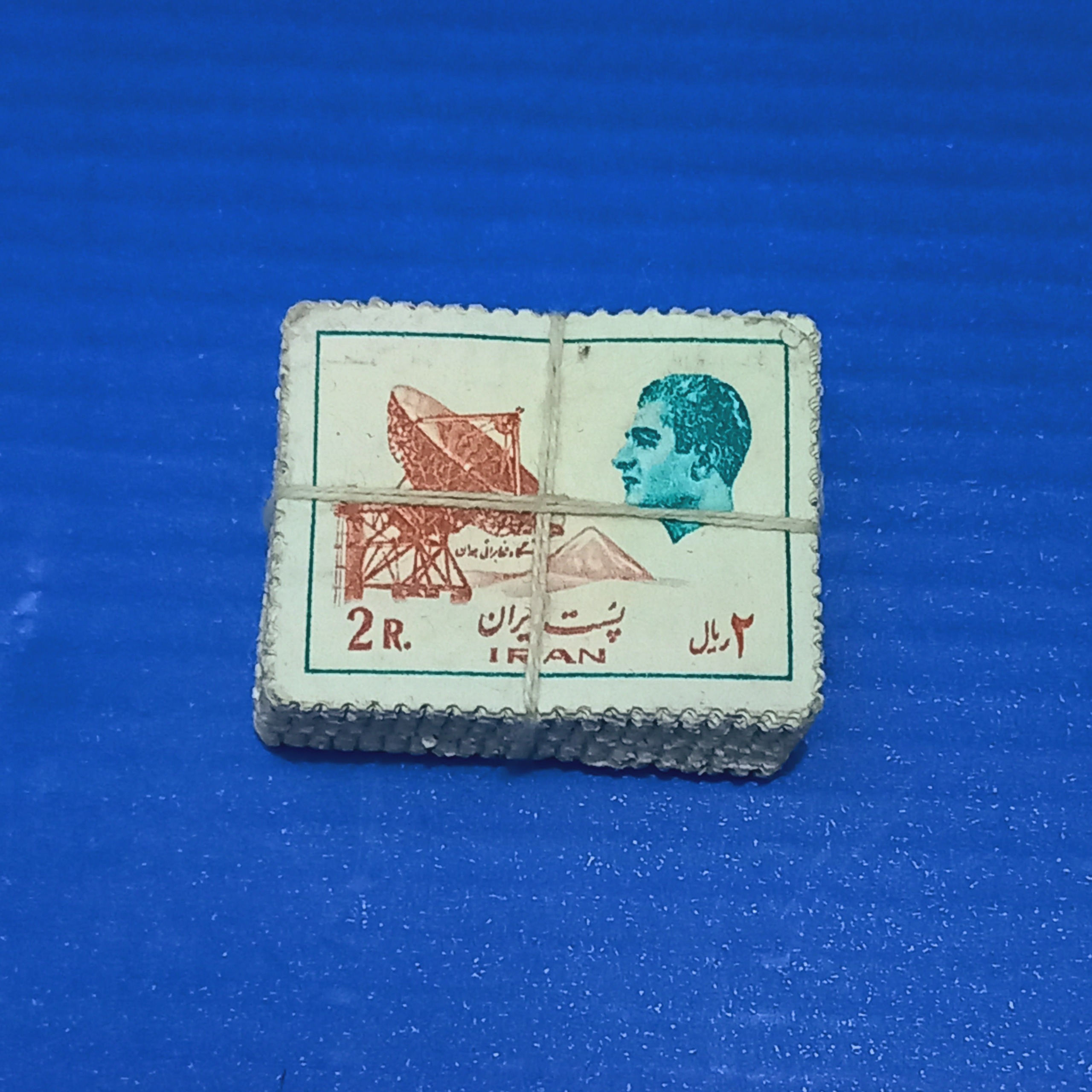 100 برگ تمبر 2ریال نیم رخ نقش ایستگاه مخابراتی