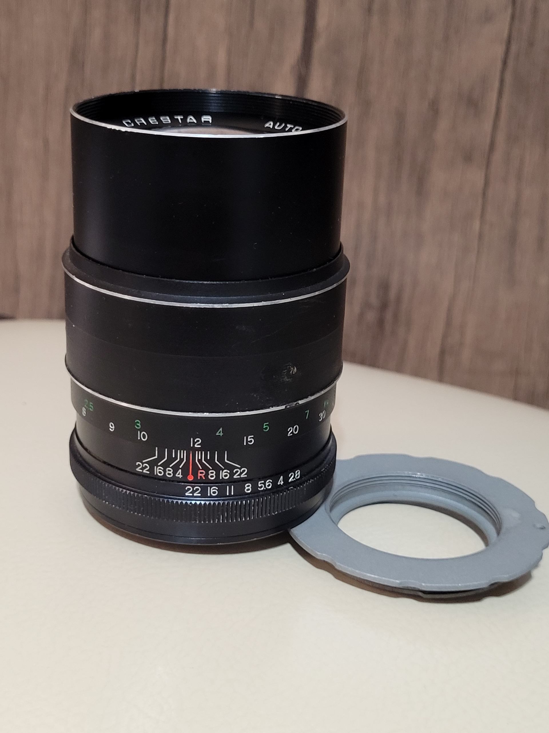 لنز 135mmF2.8 پیچی همراه با تبدیل به کانن