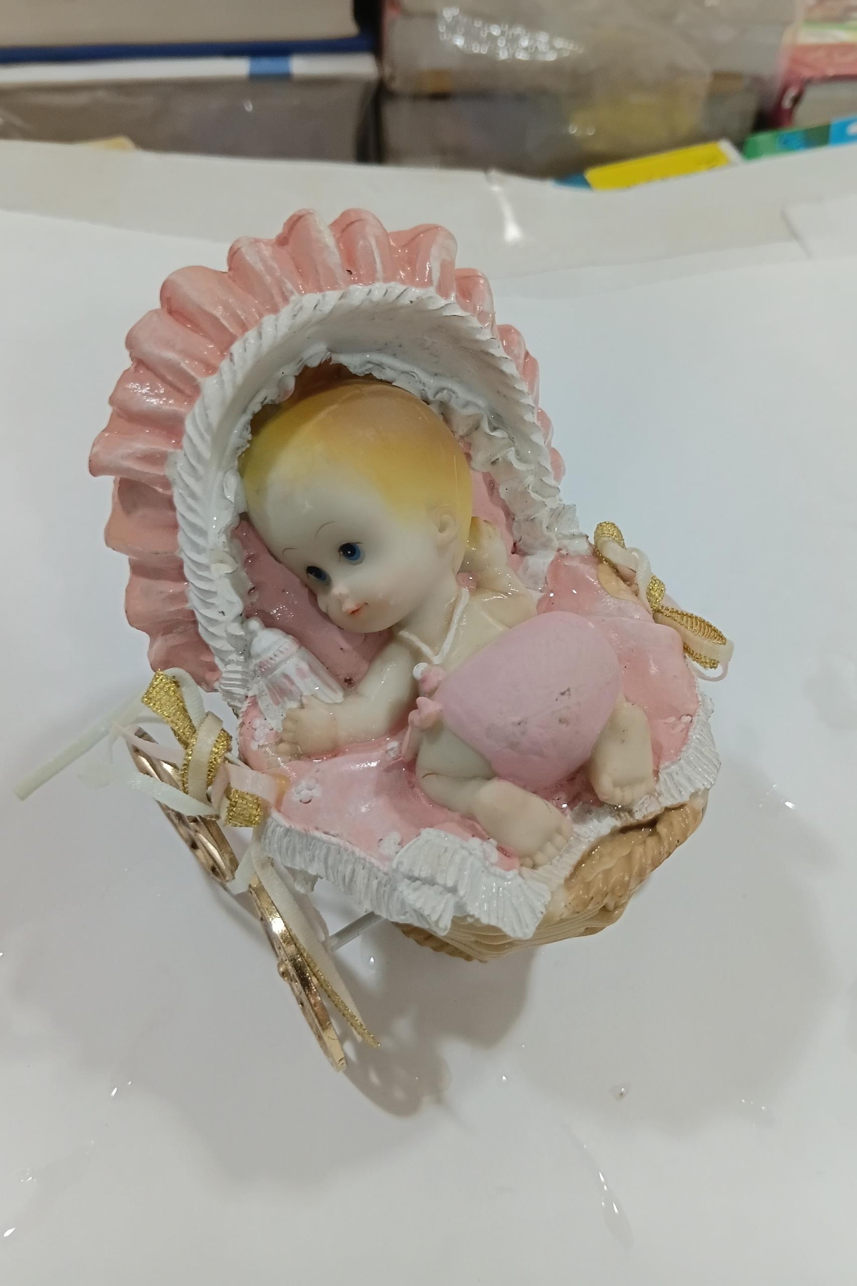 مجسمه و دکوری کودک در کالسکه