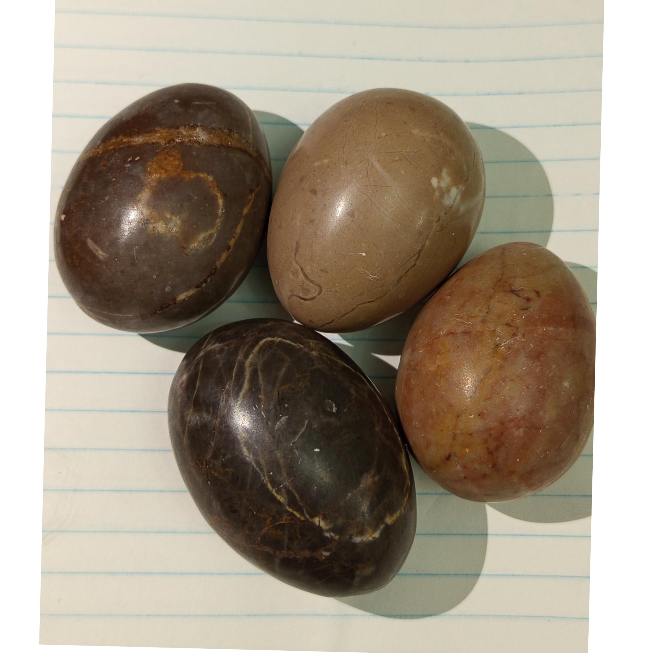 چهار عدد سنگ تراش خورده تخم مرغی شکل