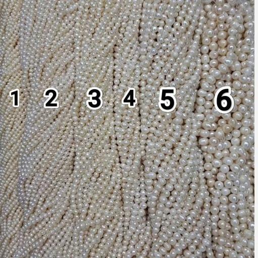 یک ریسه مروارید پرورشی طبیعی مهره گرد مروارید
