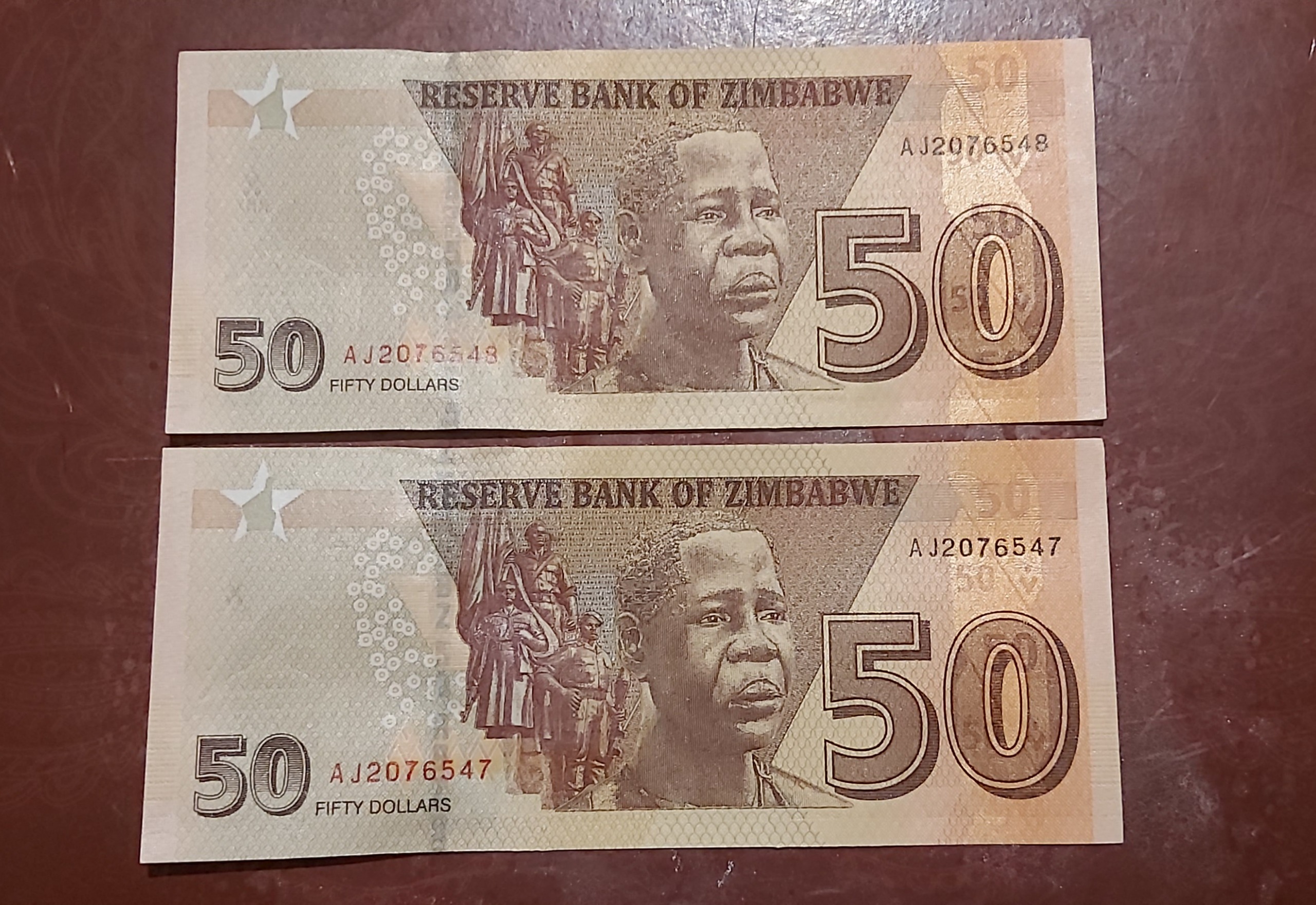 جفت اسکناس کمیاب 50دلار زیمباوه