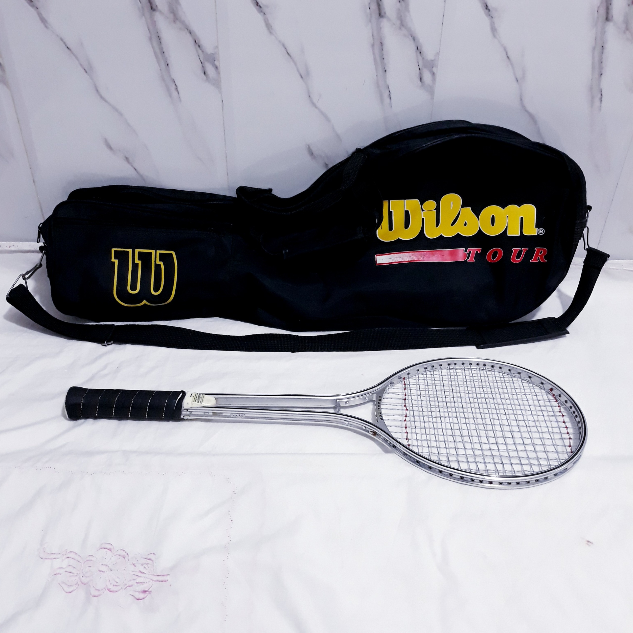 راکت بدمینتون مک گرگور، اکولایزر یک عدد باکیف