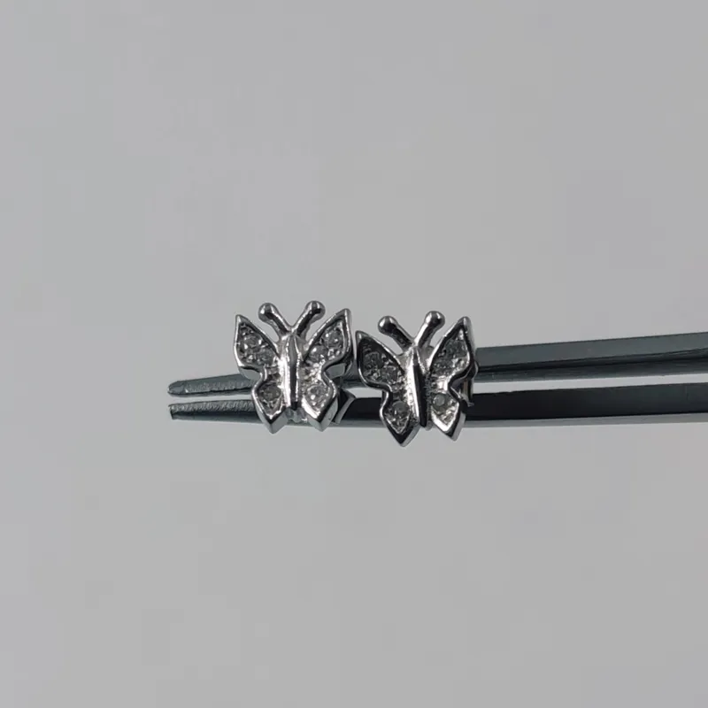 گوشواره نقره عیار 925 (مدل پروانه مخراجکاری شده)
