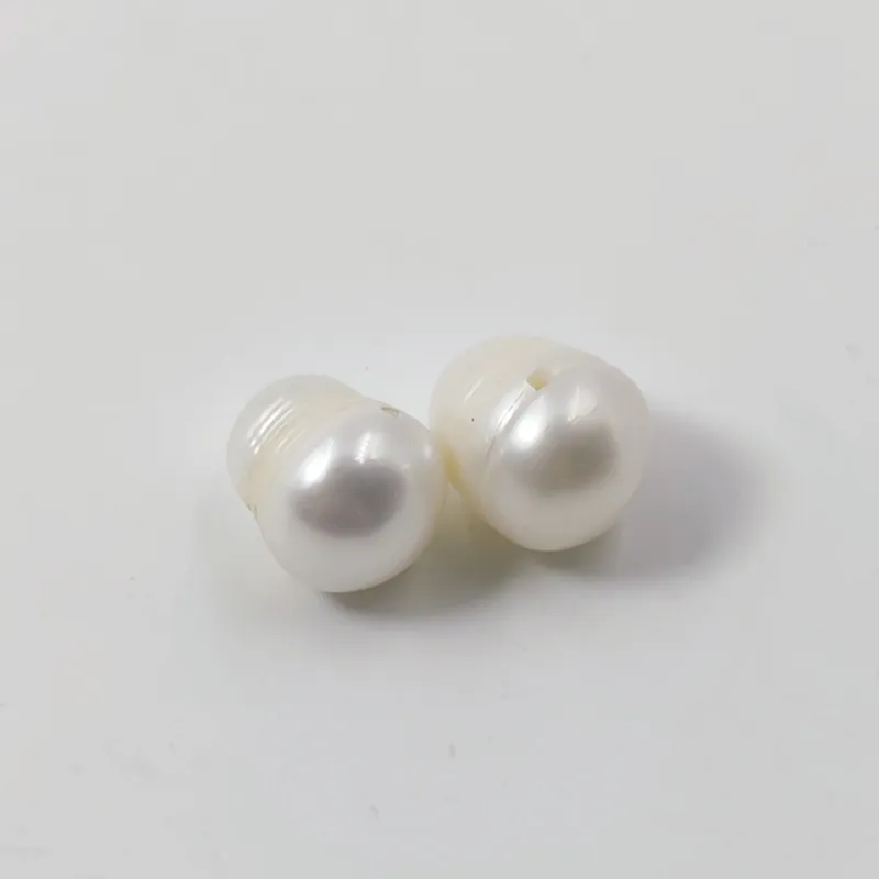دو عدد مروارید طبیعی پرورشی رنگ سفید،مناسب گوشواره