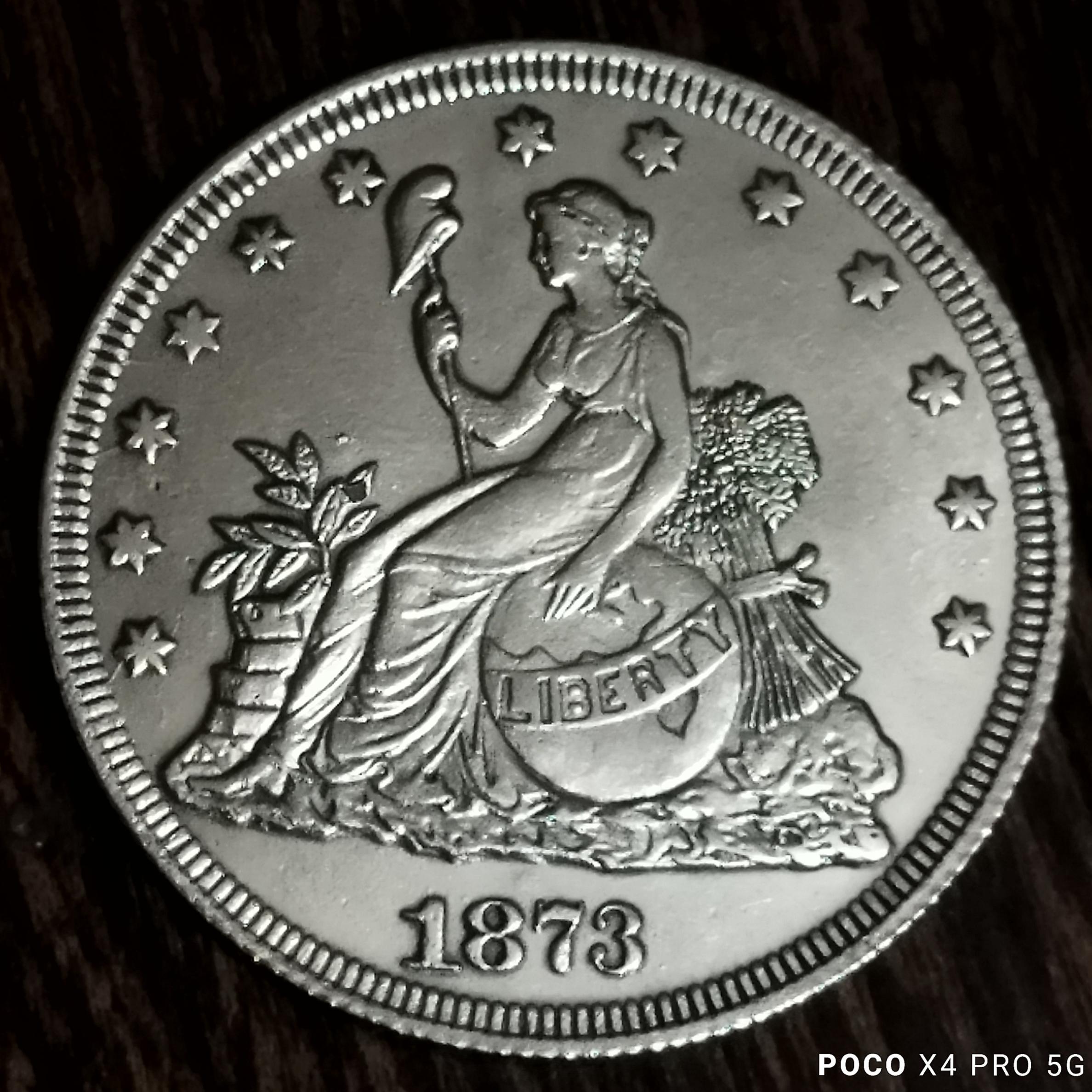 سکه روکش نقره از کشور آمریکا با تاریخ 1873 میلادی