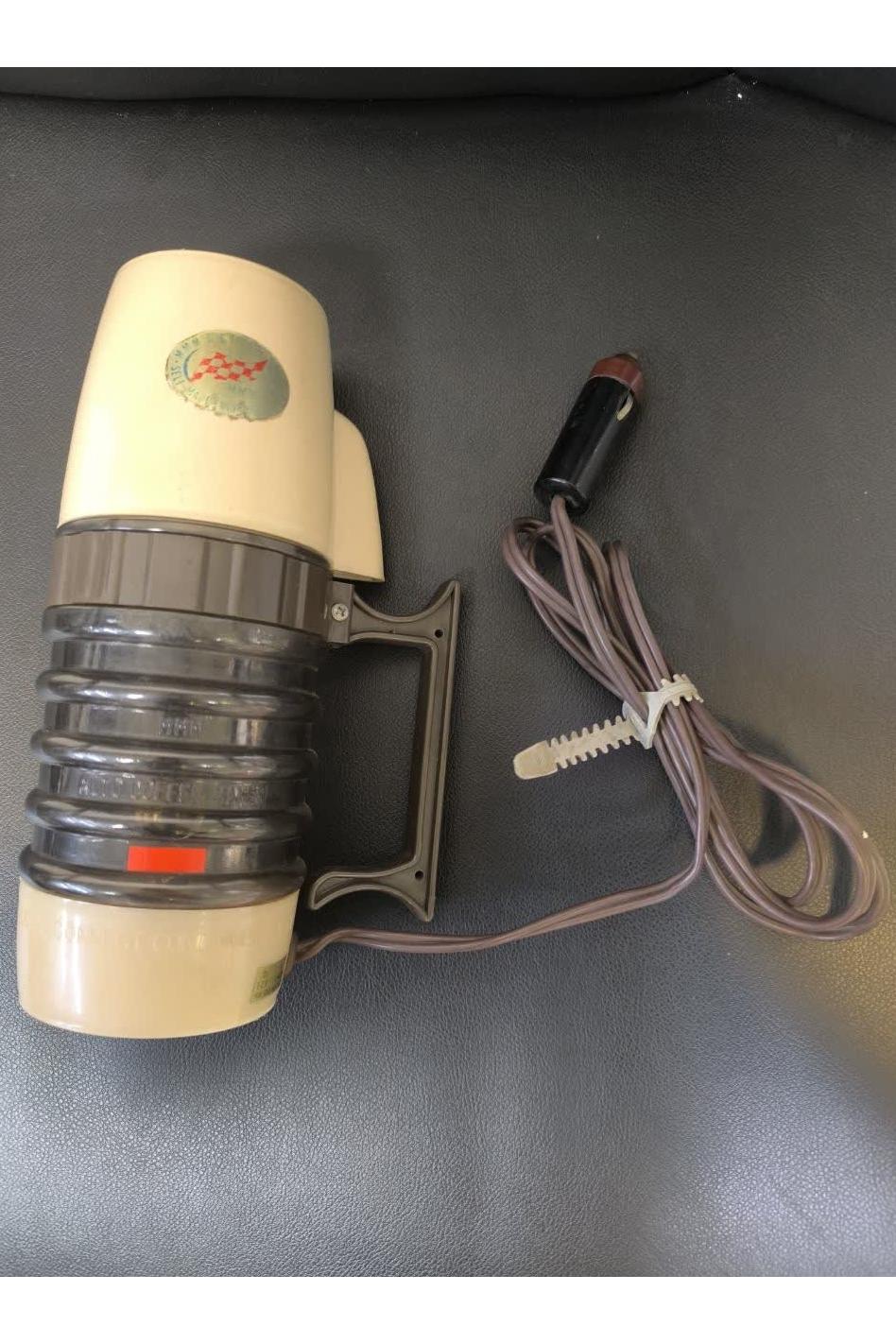 قهوه (چای)ساز ژاپنی قدیمی داخل ماشین