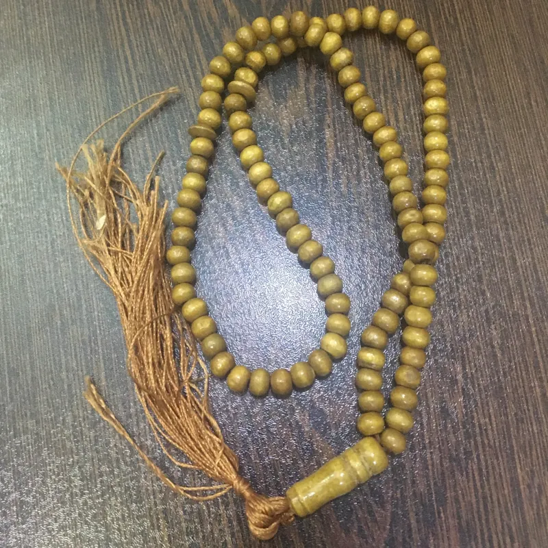 تسبیح قدیمی چوبی دانه عسلی